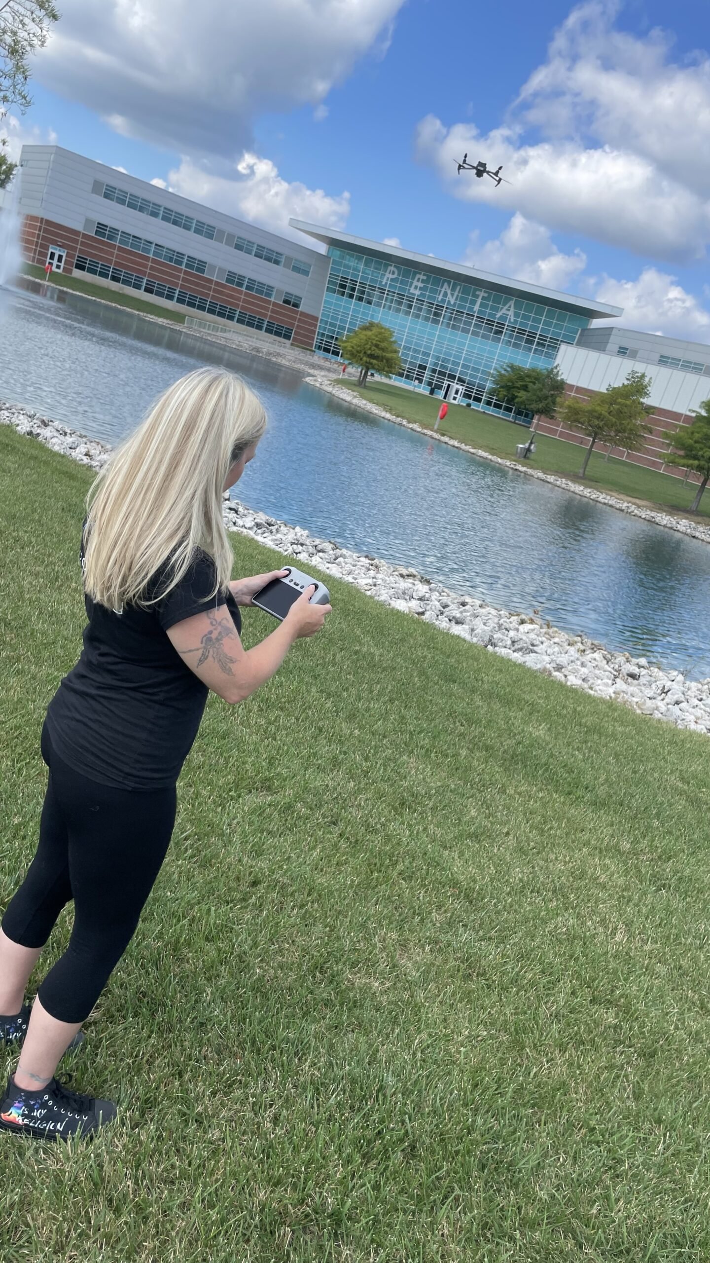 Woman Flying a Drone